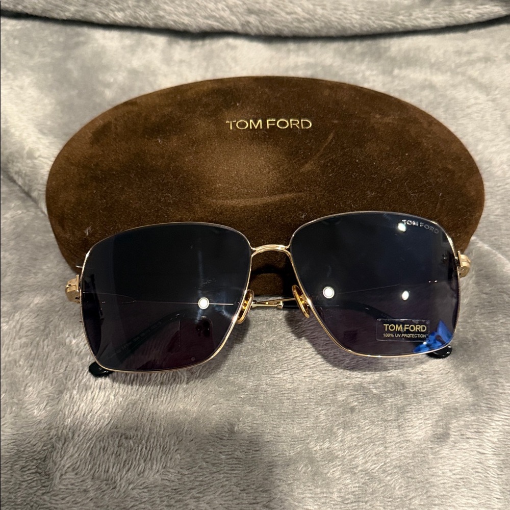 Tom Ford Sunglasses with Black Lenses and Gold Frame
Brand New